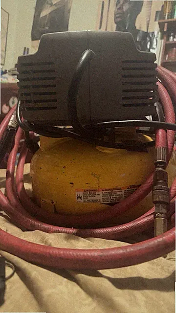 Air compressor Not Sure Of The Brand And It’s Yellow